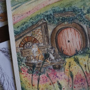 Lámina artística del Club de Gatos Hobbit: "GATOS de la Tierra Media" - Vivero del Bosque de la Comarca de Primavera. Acuarela de Tolkien y póster de "El Señor de los Anillos" (Second Breakfast ESDLA).
