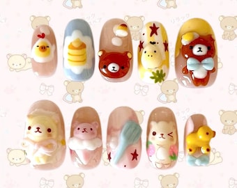May include: A collection of ten artificial nails, each featuring a different 3D cartoon character design. Designs include a duck, pancakes, a bear, a cow, and a bear with a bow. The nails are painted in pastel shades and decorated with stars and other details.