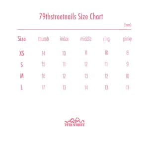 May include: A pink and white size chart for nail tips, showing measurements in millimeters for each finger size: XS, S, M, and L. The chart includes measurements for thumb, index, middle, ring, and pinky fingers.