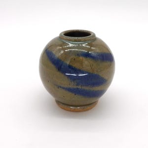 May include: A rustic wooden sign with the text "Welcome" in a handwritten style. The sign is painted white with a distressed finish, and features a simple, elegant design. Perfect for a front door or entryway.