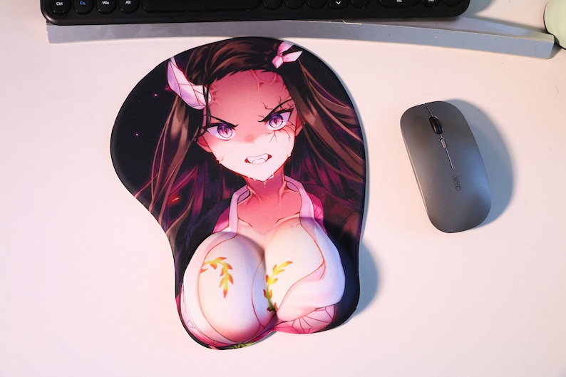 May include: A pink and purple anime-style mousepad with a female character with long dark hair and a white and pink outfit. The character has a fierce expression and is wearing a headband with a white horn.