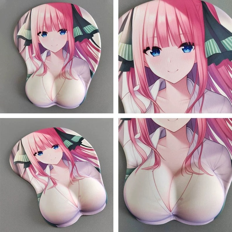 May include: An anime-style mousepad featuring a female character with pink hair and blue eyes. The mousepad has a built-in wrist rest for ergonomic support. The character is wearing a white top. The overall design is colorful and detailed.