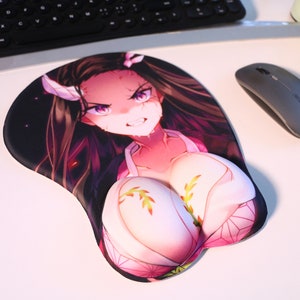 May include: A pink and white anime-style mousepad with a female character with long black hair and a pink and white outfit. The character has a fierce expression and is wearing a white headband with a pink flower.