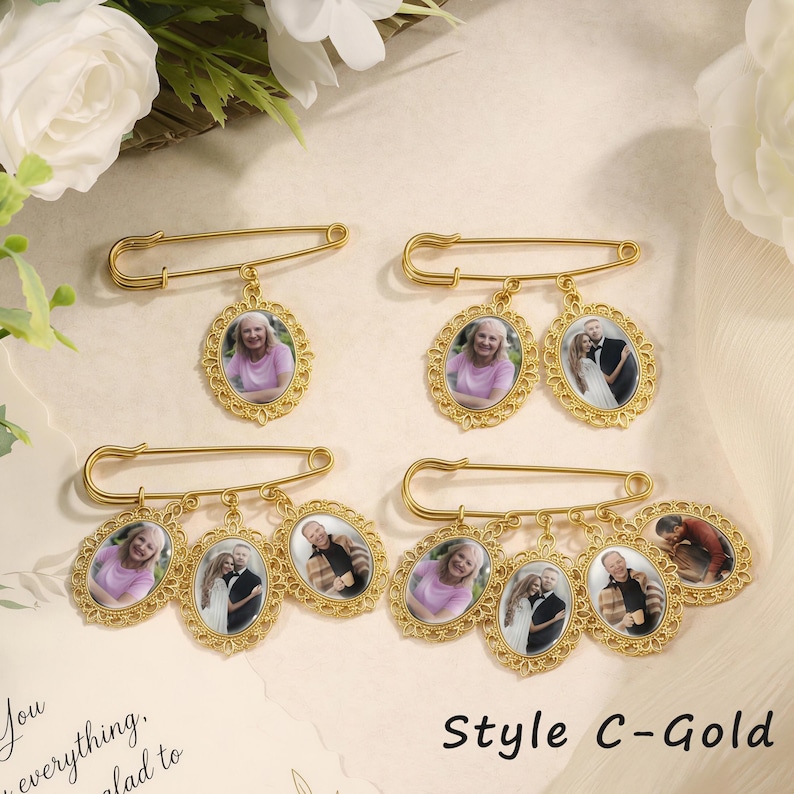 May include: Four gold-toned safety pins, each featuring one or more oval-shaped photo charms with ornate filigree borders. The charms display various portraits of individuals and couples. The text Style C-Gold is visible in the bottom right corner.