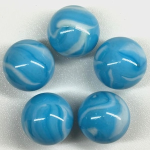 May include: Five blue glass marbles with white swirling patterns. The marbles are arranged in a circular pattern against a white background. Each marble has a glossy finish, reflecting light.