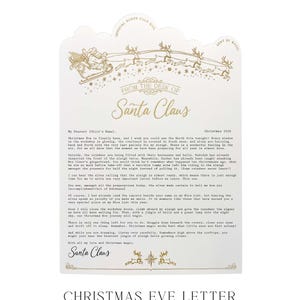 May include: A white letterhead featuring gold foil illustrations of Santa Claus in a sleigh pulled by reindeer. The text reads "From the Desk of Santa Claus" and includes a printed message about Christmas Eve, ending with a signature from Santa Claus.