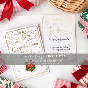 May include: A white greeting card with gold foil text and illustrations of reindeer, stars, and a bow. The card reads Congratulations, You Are An Approved Nice List Member, and includes a space for a name. A small shield-shaped pin is attached.