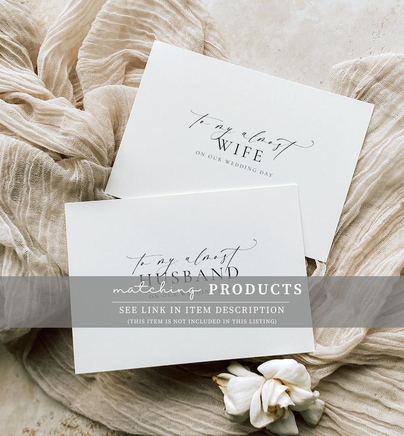 May include: Two white cards with black calligraphy text. The top card says "To my almost wife on our wedding day". The bottom card says "To my almost husband on our wedding day matching products see link in item description (this item is not included in this listing)"