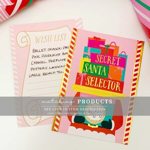 May include: Pink and gold Secret Santa Selector card with a Santa Claus illustration. A pink wish list notepad is next to the card. Both items have gold accents and are decorated with red and white stripes.