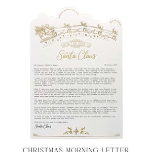May include: A white letterhead featuring gold foil illustrations of Santa Claus in a sleigh pulled by reindeer. The text reads From the Desk of Santa Claus, Christmas 2026, and includes a printed message with a signature from Santa Claus at the bottom.