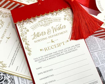 May include: A festive red and white receipt from Santa's Workshop, featuring the text "Letters & Wishes Sorting Department." The receipt is adorned with a red tassel and gold detailing. Other Christmas-themed items are visible in the background.