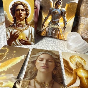 May include: A Golden Oracle card deck featuring illustrations of angelic figures with golden wings and halos. The cards have the text "Golden Oracle" and "Selbstliebe" on one card. The box has the text "Dee's Oracle".