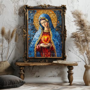 May include: A framed mosaic artwork depicting a religious figure with a blue veil and a golden halo. The figure holds a glowing heart. The artwork is in a dark ornate frame, displayed on a wooden bench.