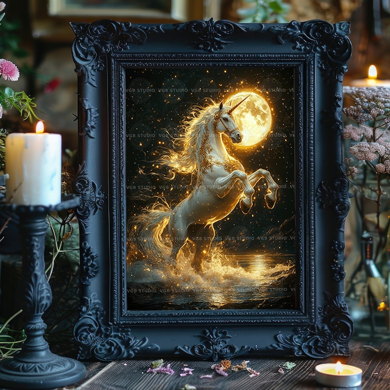 May include: A framed art print featuring a white unicorn rearing up in front of a full moon. The artwork is set against a dark, starry background with golden accents. The frame is black and ornate, with a candle and candlestick in the foreground.