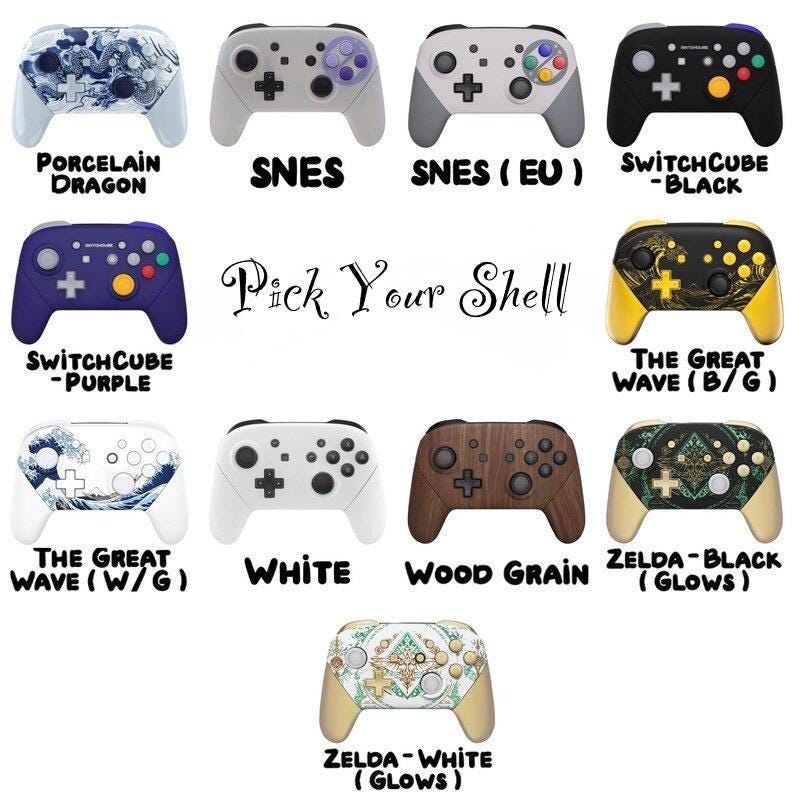 May include: A collection of eleven game controllers with various designs and colors, including Porcelain Dragon, SNES, SwitchCube, The Great Wave, White, Wood Grain, and Zelda patterns. The text Pick Your Shell is centered among the controllers.