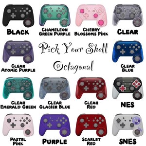 May include: A grid of sixteen video game controllers in various colors and finishes, including black, green, pink, clear, purple, blue, red, and retro-themed designs. The text reads Pick Your Shell and Octagonal, showcasing customization options.