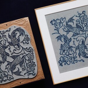 Linocut art print in indigo ink on natural irish linen featuring swimming koi fish and William Morris inspired botanical designs. Framed in a frame package. 8x10 inches.