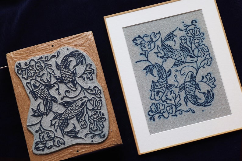 Linocut art print in indigo ink on natural irish linen featuring swimming koi fish and William Morris inspired botanical designs. Framed in a frame package. 8x10 inches.
