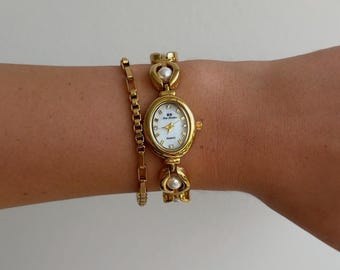 Reloj de mujer con perlas doradas, acero inoxidable, resistente al agua, joyería femenina vintage.