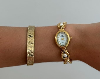 Reloj Gold Pearl: Brazalete de acero inoxidable de estilo vintage (resistente al agua)