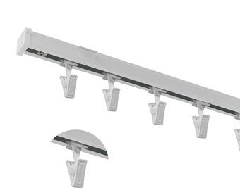 May include: White curtain track with six white plastic clips. The track is designed to hold curtains or drapes.