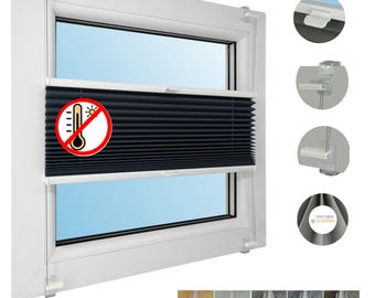 May include: A white window frame with a black pleated shade. The shade has a red and white symbol indicating heat control. Additional close-up images show the shade's mounting hardware and color swatches.