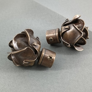 Unique pair of metal and brass plated old rose shaped curtain rod finials