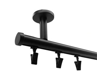 May include: Black metal curtain rod with a round end cap and a ceiling mount. The rod has four black clips attached to it.