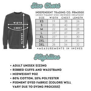 May include: Size chart for a unisex pigment dyed crewneck sweatshirt. The chart shows measurements in inches for width, chest, and length for sizes XS to 3XL. The sweatshirt is made of 80% cotton and 20% polyester.