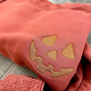 Halloween Pumpkin Face Crewneck Sweatshirt, Embroidered Jackolantern Pullover, Tonal Spooky Season Sweater,  Trendy Fall Apparel, Unisex
