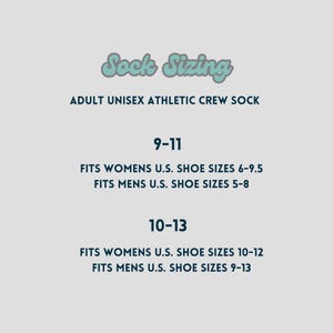May include: A light blue graphic with text detailing sock sizing for adult unisex athletic crew socks. The text includes sizes 9-11, fitting women's U.S. shoe sizes 6-9.5 and men's U.S. shoe sizes 5-8. Also includes sizes 10-13.