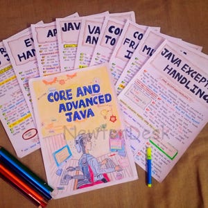Aesthetic handwritten Java programming notes arranged neatly on a table, featuring colorful diagrams and headings like "Core and Advanced Java," "Java Exception Handling," and more, ideal for students or beginners learning Java. Perfect study aid with visually engaging content and organized layout.