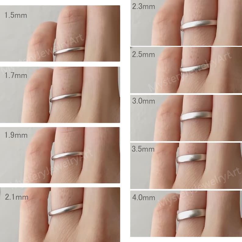 May include: A collection of silver rings in various widths, ranging from 1.5mm to 4.0mm, displayed on a finger. Each ring's width is clearly labeled in millimeters, showcasing the different sizes available. The rings have a simple, smooth design.