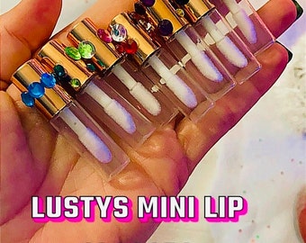 Pocket sized , mini lip balms .Lustys mini lip glosses! Comes in variety of colors and flavors! Also comes with accessories