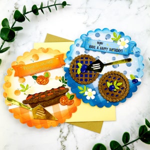 handmade round birthday cards with food, pie, blueberries pie, oranges, orange pie spellbinders lawn fawn interactive shaker pup up card