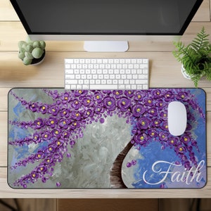 May include: Purple and gold floral design mousepad with the word "Faith" in white script.