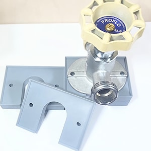 May include: A chrome water shut-off valve with a white plastic handle labeled "PROFLO 22-B". The valve is attached to a gray plastic wall plate with a cutout for the valve.