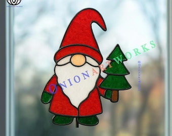 May include: A stained glass gnome decoration with a red hat and coat, white beard, and green shoes. The gnome holds a green Christmas tree. The text "ONIONARTWORKS" is visible on the gnome and in the background.