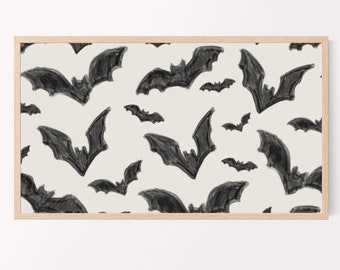 May include: A framed print with a white background and a repeating pattern of black bats.