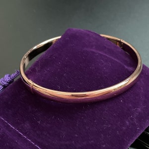 Pulsera Esclava Con Bisagras En Oro Rosa Laminado De 9 Quilates