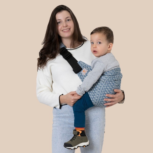 Porte-bébé – Cadeau élégant pour une fête prénatale. Coton biologique, peut supporter jusqu'à 20 kg, testé pour la sécurité, design compact