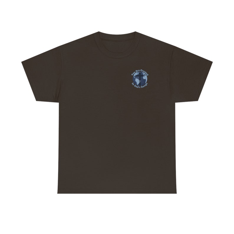 May include: A dark brown t-shirt with a blue and white graphic of a globe with a cross on it. The graphic says "You Are Created In God's Image".