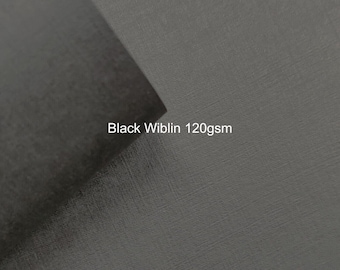 May include: Black Wiblin 120gsm paper. The paper has a textured surface.