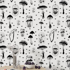 May include: Black and white wallpaper featuring a repeating pattern of mushrooms, stars, and moons. The mushrooms are of varying shapes and sizes, with some topped by a crescent moon. The background is a light grey.
