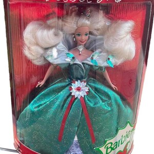 Muñeca Barbie Happy Holiday Special Edition con una impresión autografiada y una carta del diseñador de Barbie y director de operaciones de Mattel