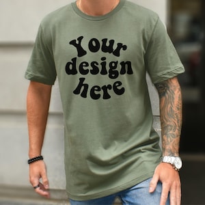 Military green Bella Canvas 3001 T-shirt mockup  Men Model mockup - Lifestyle shirt mockup BC 3001 mockup military green male model, Outdoor