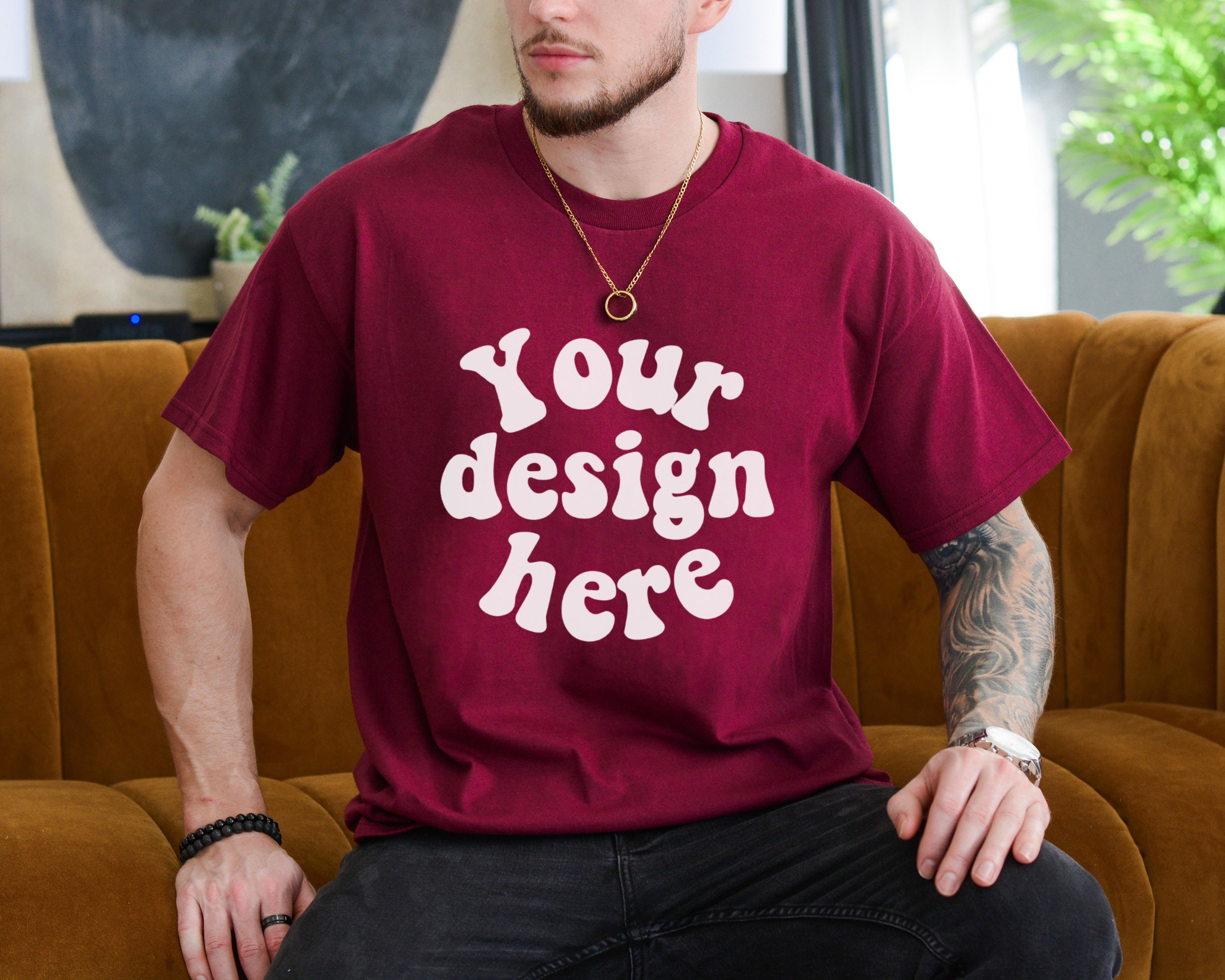 Blank red burgundy t-shirt mockup on clothes (1603545)