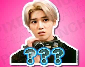 May include: A sticker featuring a portrait of a young man with blonde hair, wearing a black shirt and holding a camera. The image has three blue question marks in front of him.