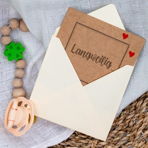 Schwangerschaft verkünden Karte zum Aufziehen Aufdruck "Langweilig...  ...wirds zukünftig nicht. Herzlichen Glückwunsch! Du wirst ..."