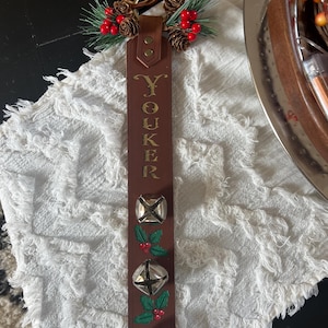 Personalized leather sleigh bell door hanger